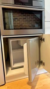 Věžička u Vřídla (Tower apartment in centre)