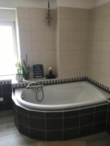 Appartements Cote Rive, au bord de la riviere La Moselotte et terrasse : photos des chambres