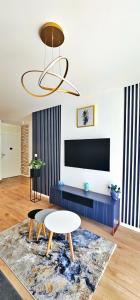 Apartament Whiteblue Kołobrzeg z dużym ogródkiem - 100 m od plaży! Whiteblue Kolberg Apartment mit großem Garten - 100 m vom Strand entfernt! Whiteblue Kołobrzeg Apartmán s velkou zahradou - 100 m od pláže!