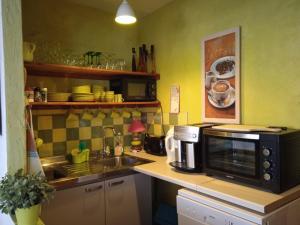 Appartements & Chambres Les Loges du Capucin : photos des chambres