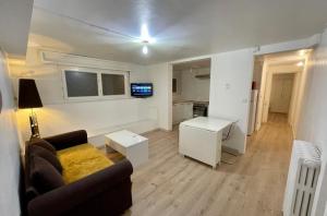 Appartements Appartement en soubassement : photos des chambres