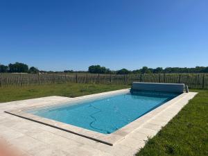 Maisons de vacances Charmante petite maison avec piscine : photos des chambres