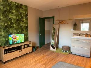 Appartements Welcome to the Jungle ! : photos des chambres