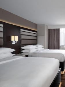Queen Room with Two Queen Beds - Hearing Accessible room in Best Western Premier Jacksonville Hotel