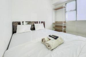 RedLiving Apartemen Urbantown Serpong - Aurora Rooms