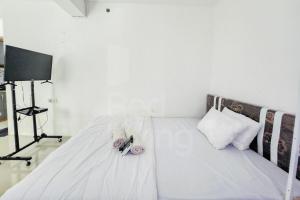 RedLiving Apartemen Urbantown Serpong - Aurora Rooms