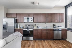 Sleek 2BR Downtown Retreat with Gym