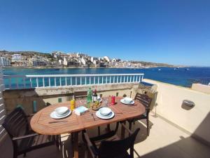 Blue Harbour Seafront Penthouse with large terrace with panoramic sea views - by Getawaysmalta