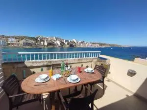 Blue Harbour Seafront Penthouse with large terrace with panoramic sea views - by Getawaysmalta - Mġarr