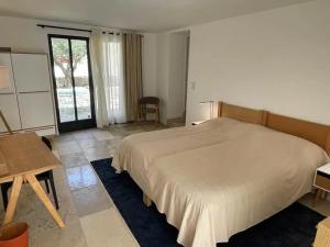 Villas Villa de 5 chambres avec piscine privee jardin clos et wifi a Menerbes : photos des chambres