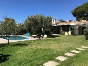 Villa con piscina sulla spiaggia di Porto Giunco. - Notteri