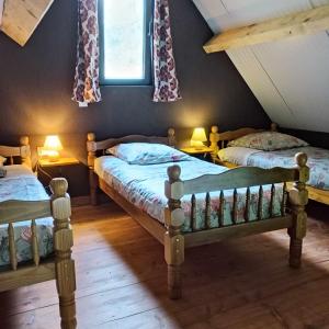 Campings A la cabane des Bois dessus Tiny Gite : photos des chambres