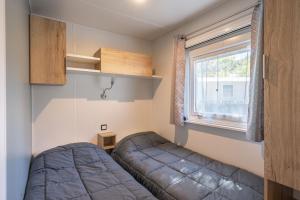 Campings Mh 169 Ronce les bains : photos des chambres