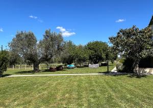 Camera Familiare con Vista Giardino