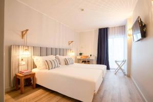 One-Bedroom Apartment with City View room in Aqualuz Lagos by The Editory