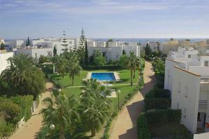 Chalet Adosado Residencial 1ª Línea de Playa 4 Piscinas 2 Jardines Parking