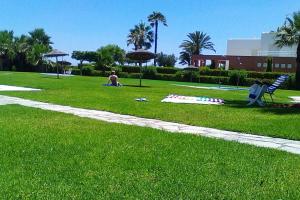 Chalet Adosado Residencial 1ª Línea de Playa 4 Piscinas 2 Jardines Parking