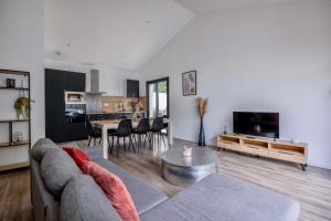 Maisons de vacances Maison T4 Climatisee avec Jacuzzi a Lagord : photos des chambres
