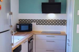 Appartements haut de Villa Fumseck climatise : photos des chambres