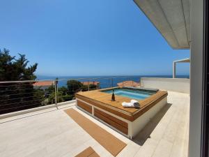 Luxury Seafront Villa with Rooftop Pool & Stunning Sea Views