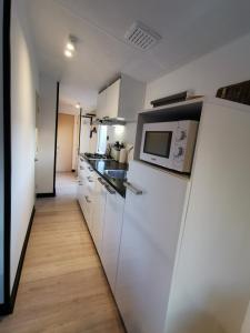 Stacaravan op 5 Sterren Vakantiepark De Kuilart Friesland aan het Meer met Zwembad 5P 116