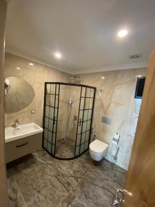 Rena Grand Residence & Suit