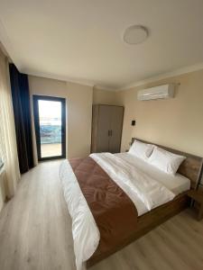 Rena Grand Residence & Suit