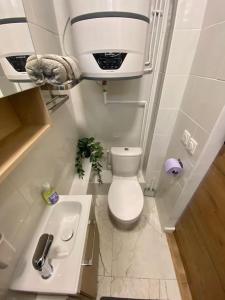 Appartements Cosy Studio neuf centre-ville : photos des chambres