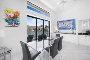 Waterfront home on key lot with pool, spa and views