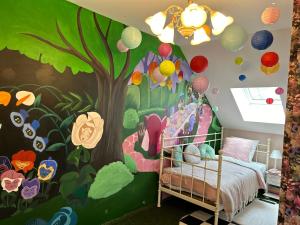 B&B / Chambres d'hotes Le Terrier, chambre d-hotes a theme Alice au pays des merveilles : photos des chambres