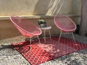 Appartements Logement cosy avec piscine ,parking et jardin : photos des chambres
