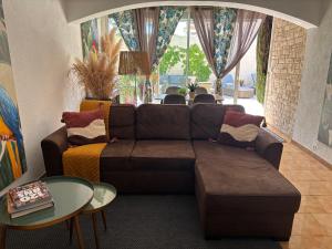 Appartements Logement cosy avec piscine ,parking et jardin : photos des chambres