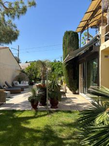 Appartements Logement cosy avec piscine ,parking et jardin : photos des chambres