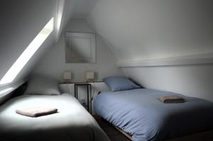 Maisons de vacances Petite vague - maison atypique avec terrasse : photos des chambres