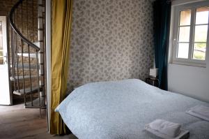 Maisons de vacances Petite vague - maison atypique avec terrasse : photos des chambres