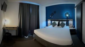 Hotels rev'hotel : photos des chambres