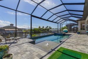 Gulf Access, Putting Green, Outdoor Kitchen, Heated Pool & Spa & MORE! - Villa Captains Quarters