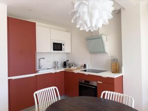 Appartements Les suites du 13 : photos des chambres