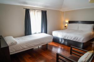 Comfort Triple Room room in Hotel Baeza Monumental