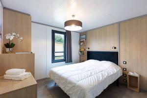 Villages vacances Les Cottages de La Baule : Chalet de standing 7 personnes - Piscine : photos des chambres