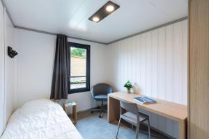 Villages vacances Les Cottages de La Baule : Chalet de standing 7 personnes - Piscine : photos des chambres