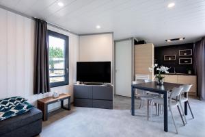 Villages vacances Les Cottages de La Baule : Chalet de standing 7 personnes - Piscine : photos des chambres
