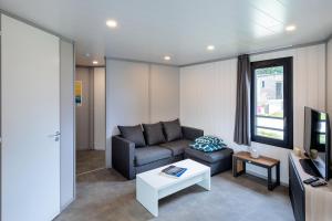 Villages vacances Les Cottages de La Baule : Chalet de standing 7 personnes - Piscine : photos des chambres