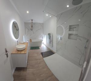 Appartements *le hangar du Paradis * : photos des chambres
