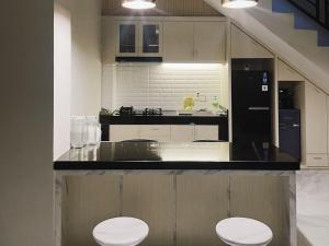 Urbanview Hotel Wollangi Syariah Panakkukang Makassar