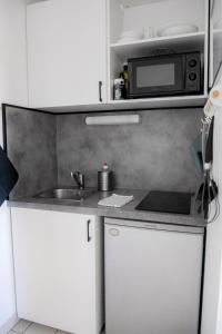 Appartements Le Laurier - Cosi - WIFI - Parking - Balcon : photos des chambres