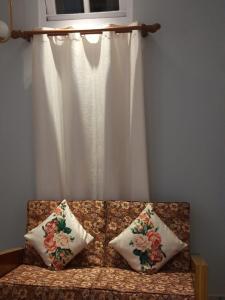 Riverside Palm 1BHK with AC and Terrace Access near Kamakhya temple