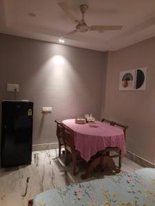 Riverside Palm 1BHK with AC and Terrace Access near Kamakhya temple