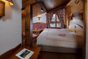 Hotels Chalet-Hotel Neige et Roc, The Originals Relais (Hotel-Chalet de Tradition) : photos des chambres