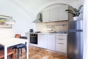 Green Oasis Apartment In The City With A Patio